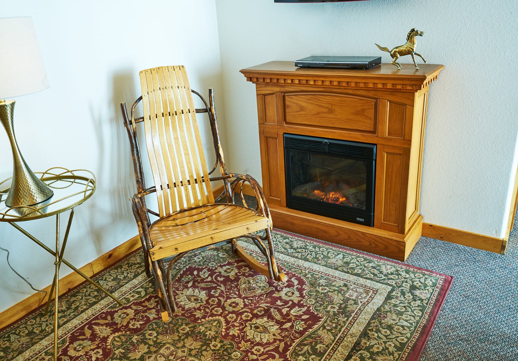 Sweetgrass Room rocking chair and electric fireplace