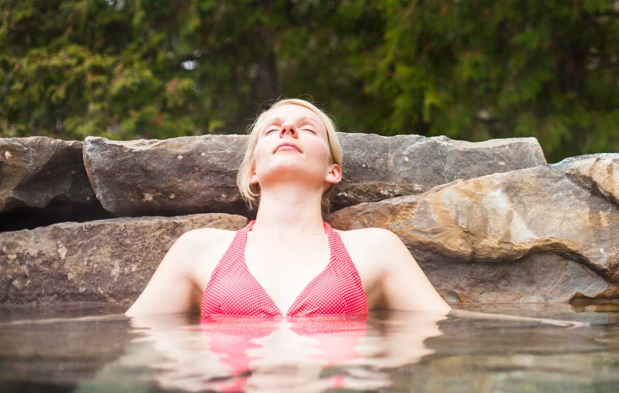 Woman relaxing in a hotspring