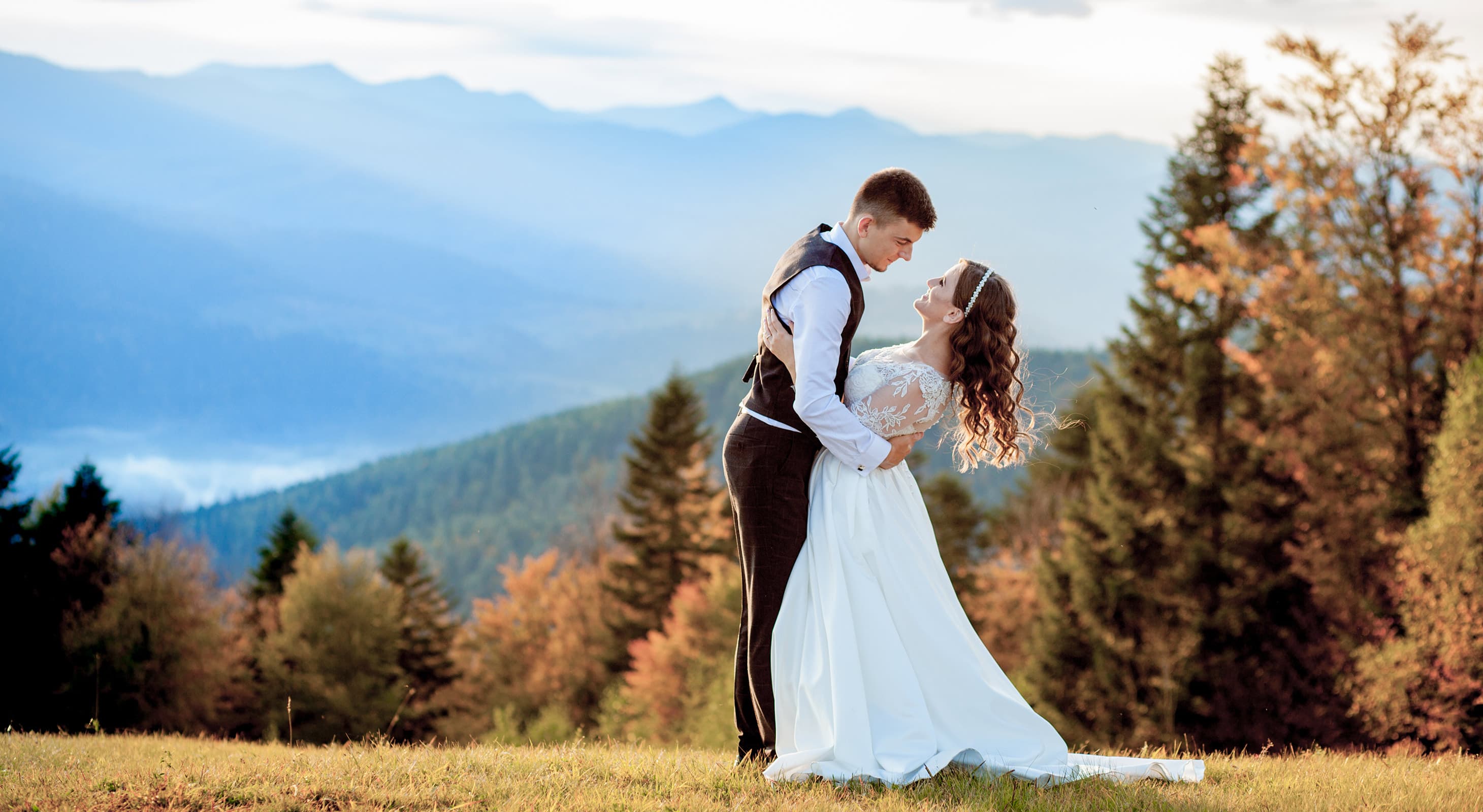 bride and groom in the mountains